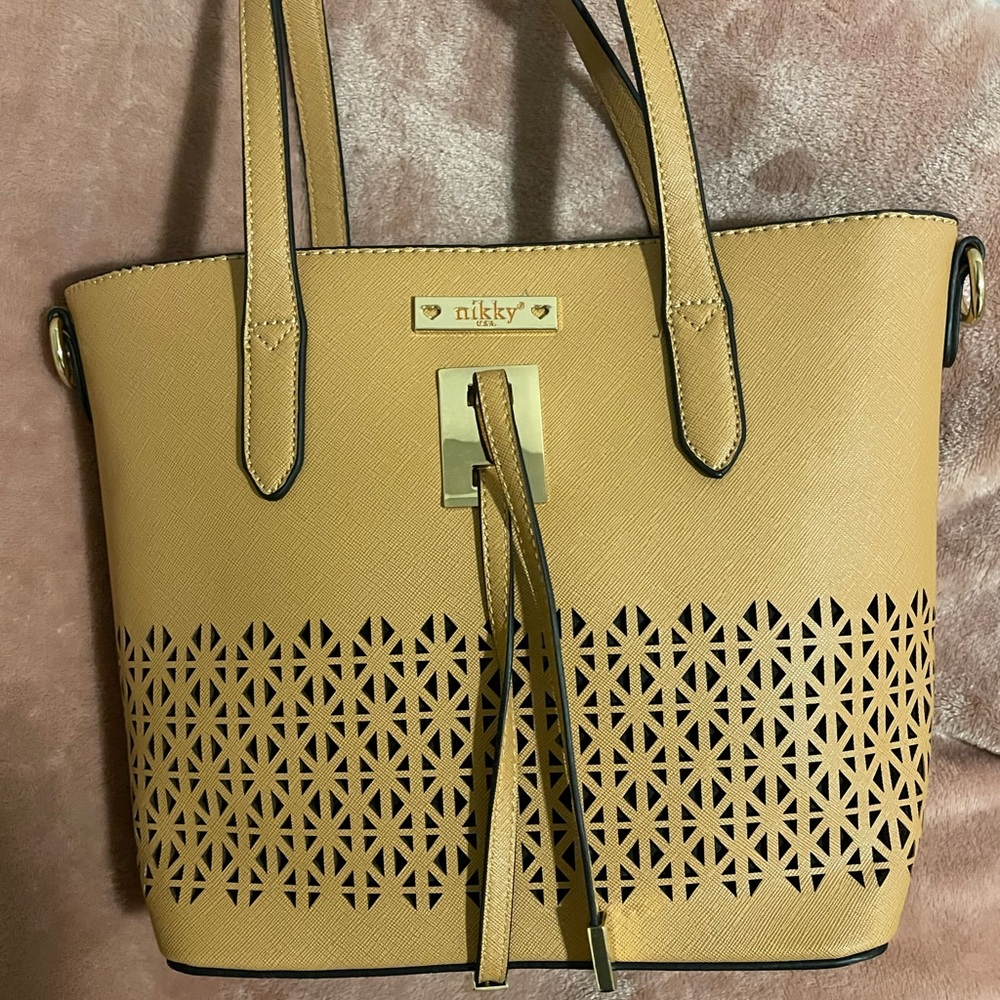 Tan mid-size top handle bag